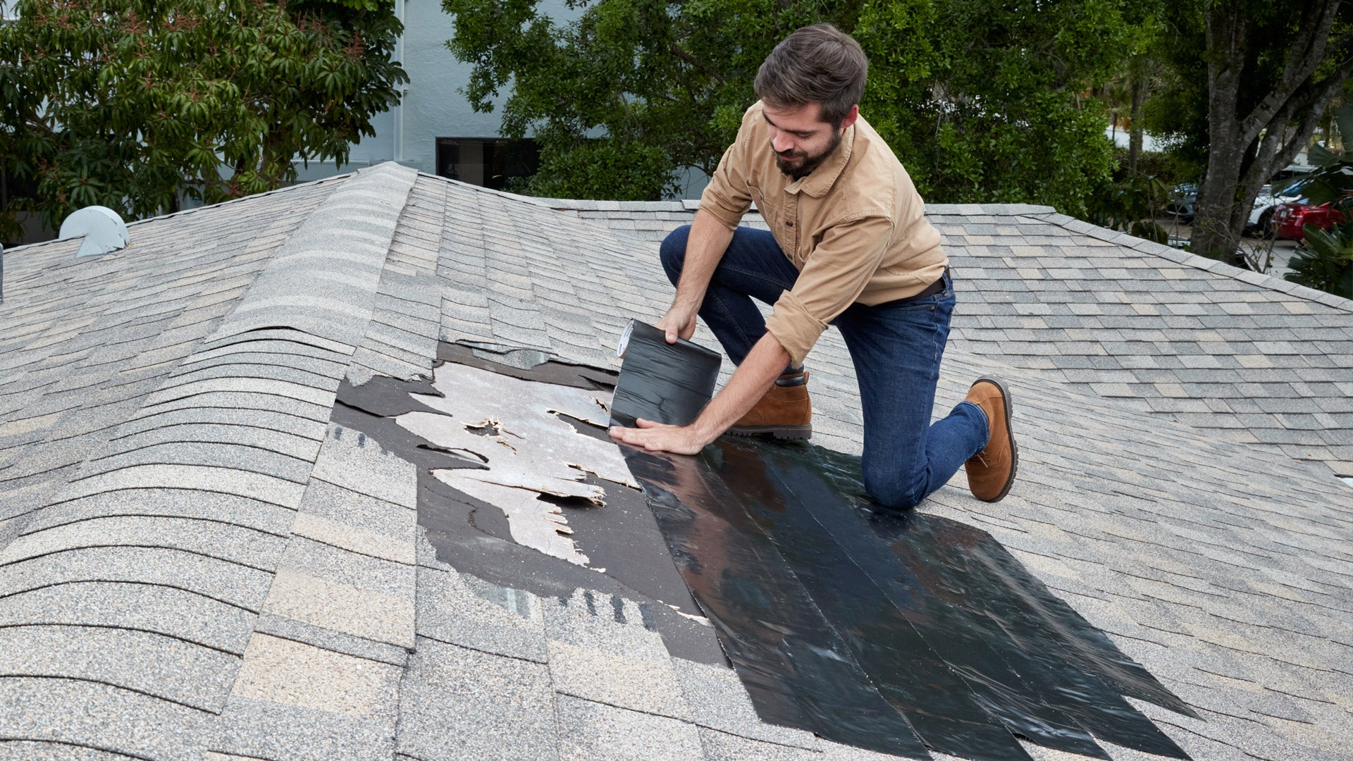 Repairing Roof Damage With Flex Tape MAX. Photo by Flex Seal Studios.