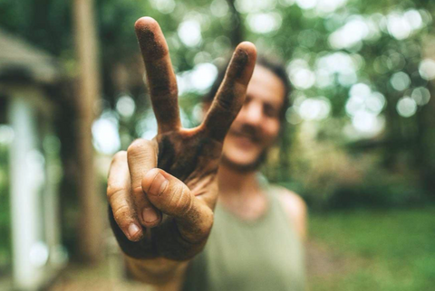 Man doing peace sign