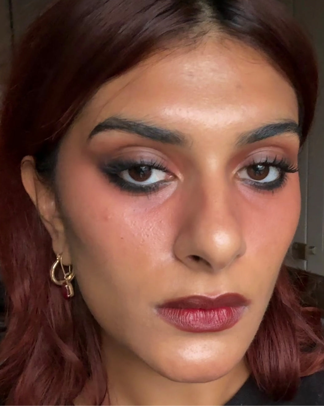 Model wears under eye blush trend achieved with Milk Makeup products