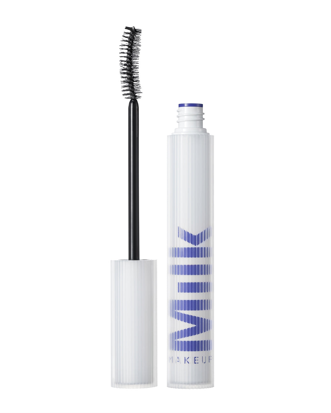 Unscrewed tube of Milk Makeup RISE Waterproof Mascara with the wand next to it on a white background