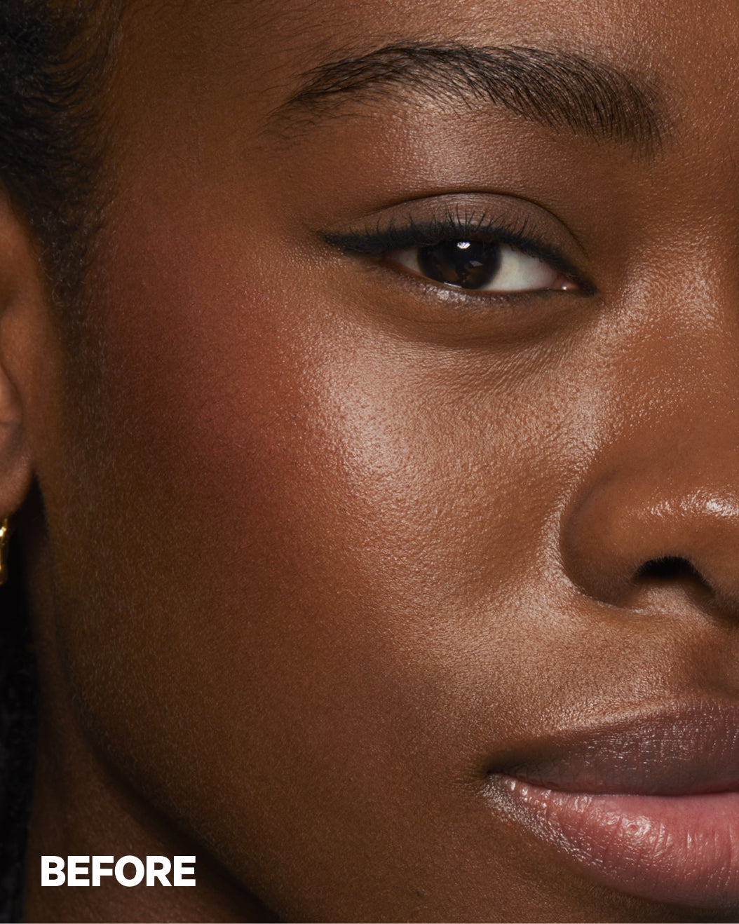 Close-up of model's eyebrow before applying KUSH Brow Lamination Gel on a white background