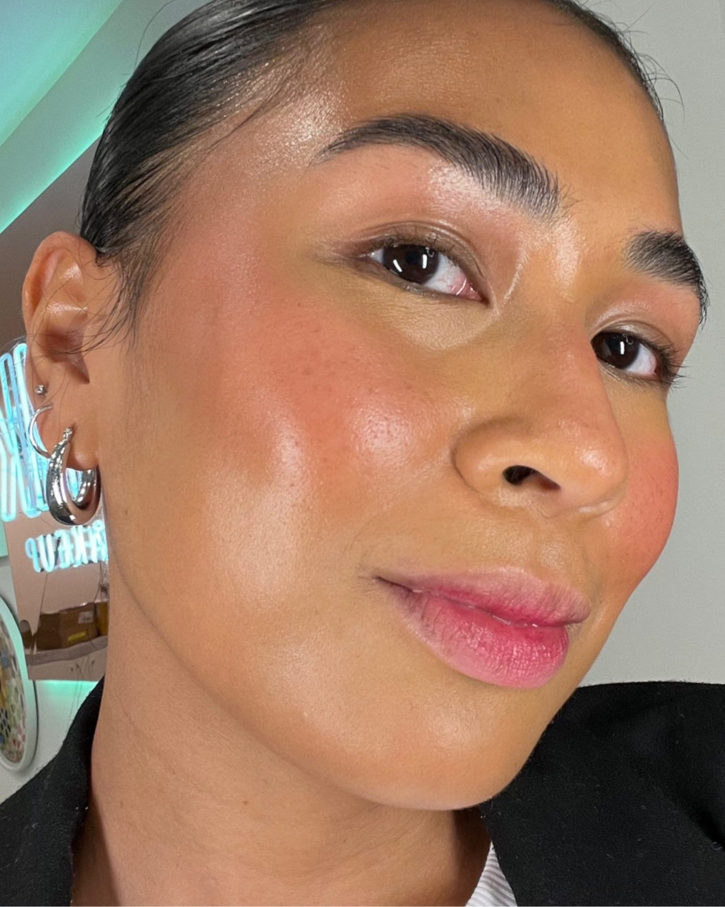 Selfie of a woman with a medium skin tone wearing Milk Makeup Lip + Cheek in Quickie