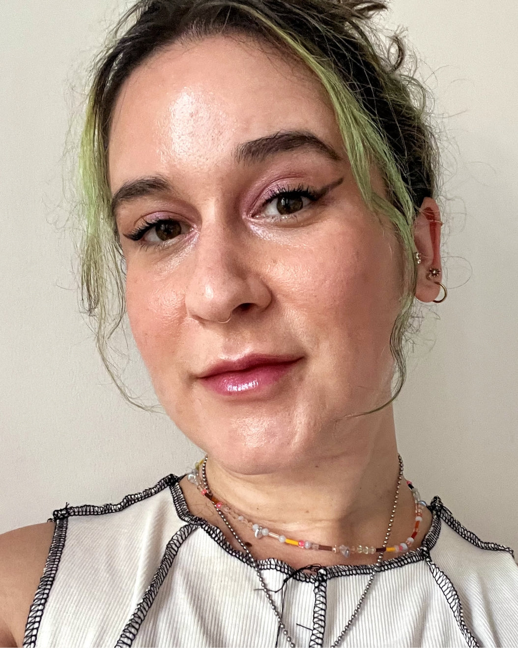 Devon wears Milk Makeup Bionic Blush for a glowy, summer look