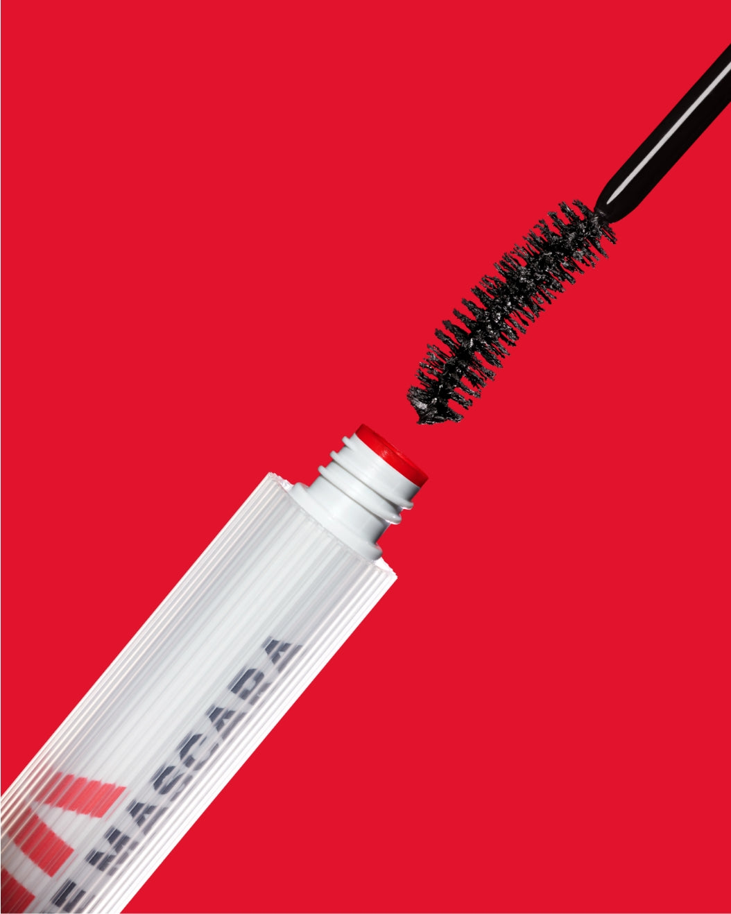 Lash Lift Brush in Milk Makeup RISE Mascara helps lashes hold a curl