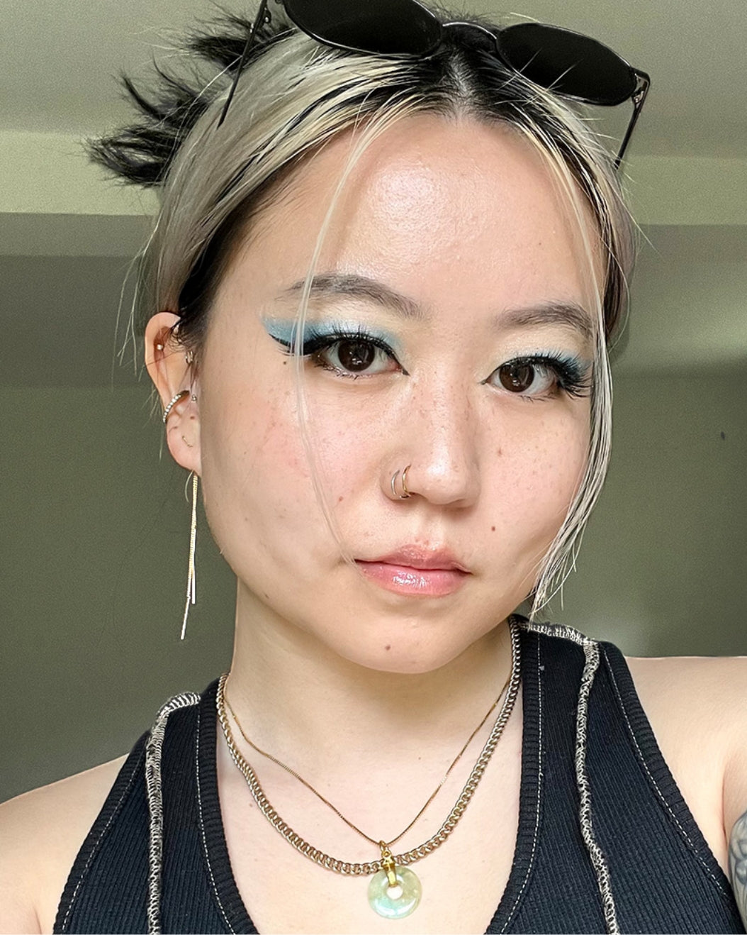 Iley wears Milk Makeup Color Chalk to create a frosty, blue eyeshadow