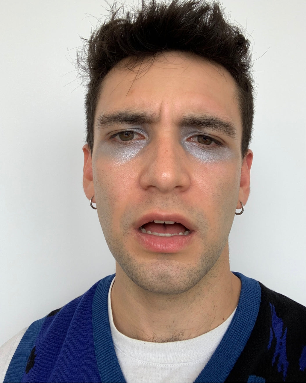 Robert wears Milk Makeup Color Chalk for a silver eye look
