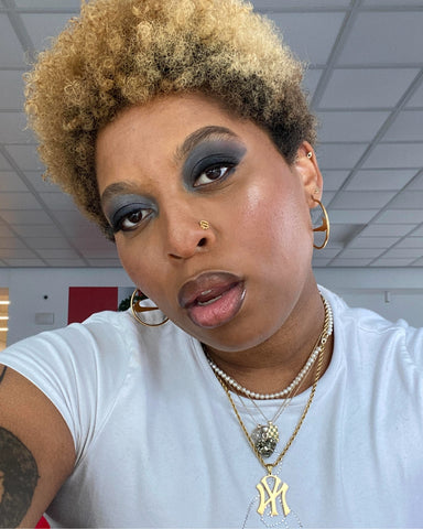 Content creator wears Milk Makeup Color Chalk for a cool toned eye