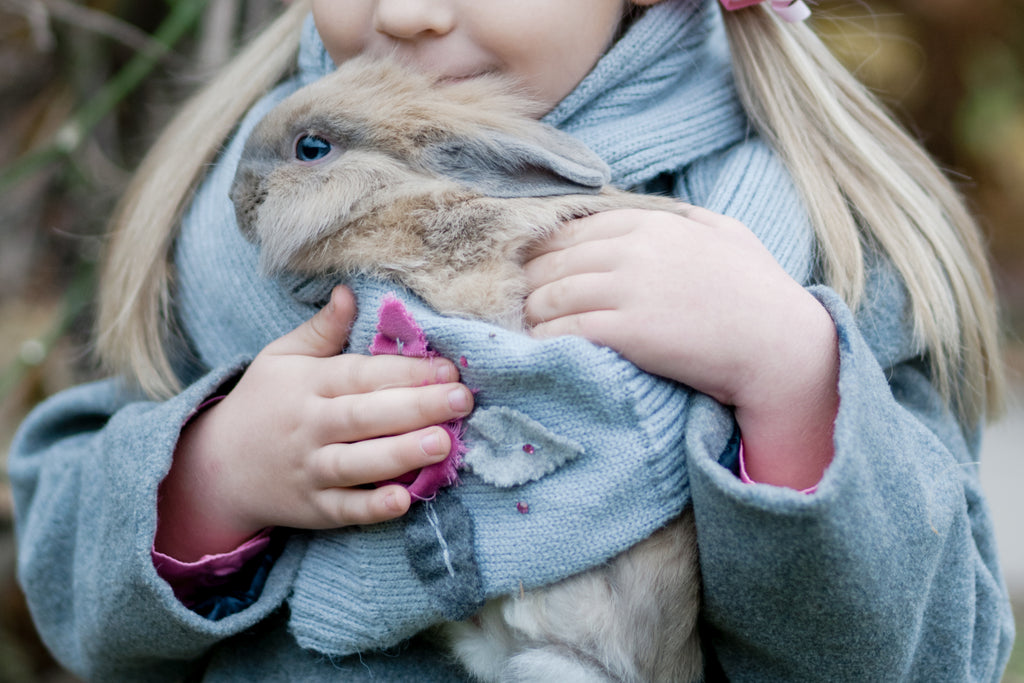 young child with bunny
