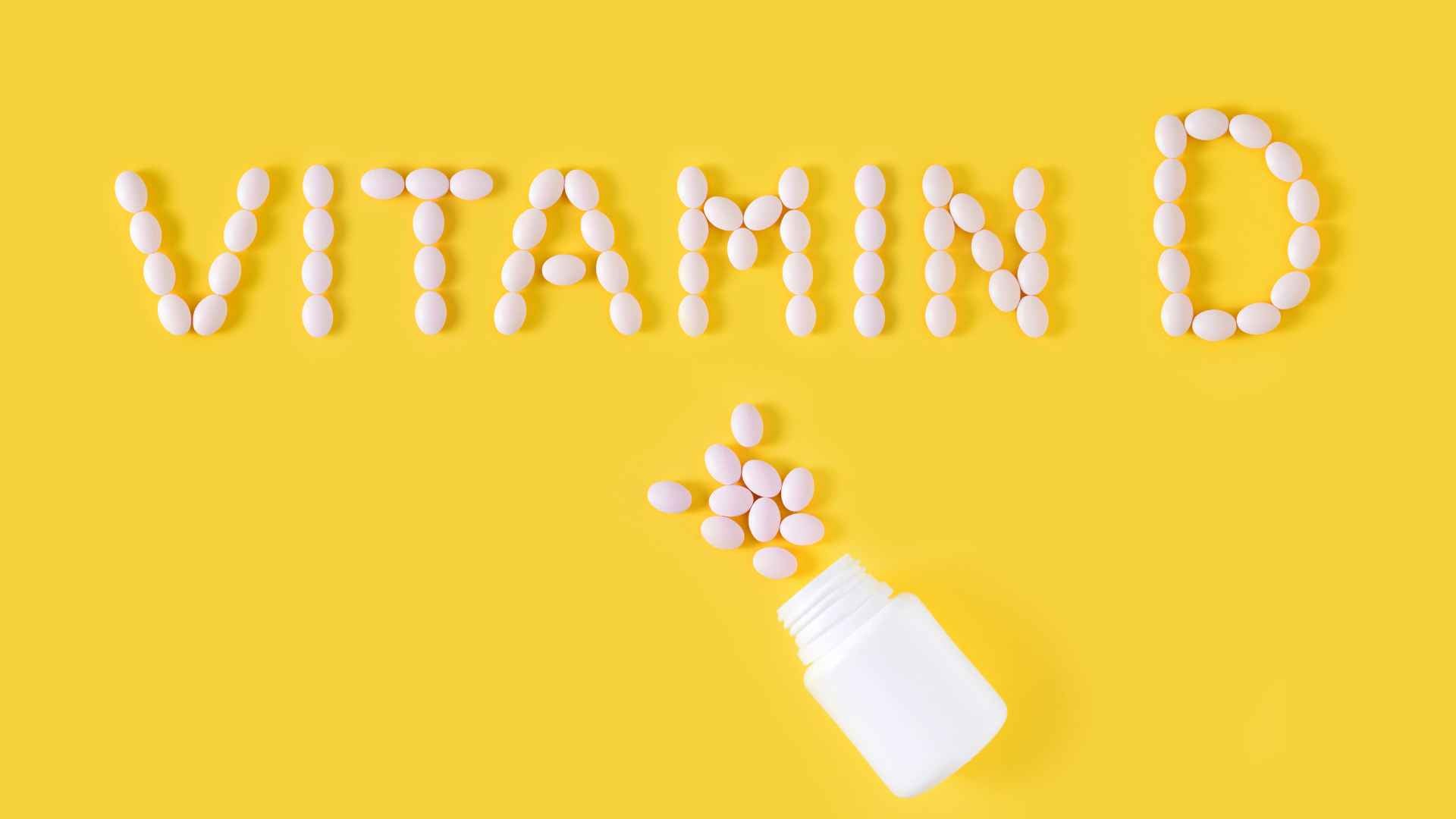 "Vitamin D" spelled out using vitamin D pills. 
