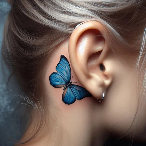 small butterfly tattoo behind ear