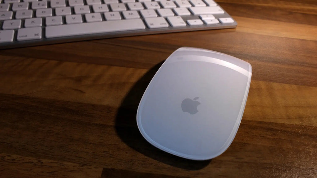 Magic Mouse on brown desk