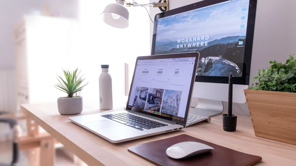 Work Desk with macbook, desktop and magic mouse