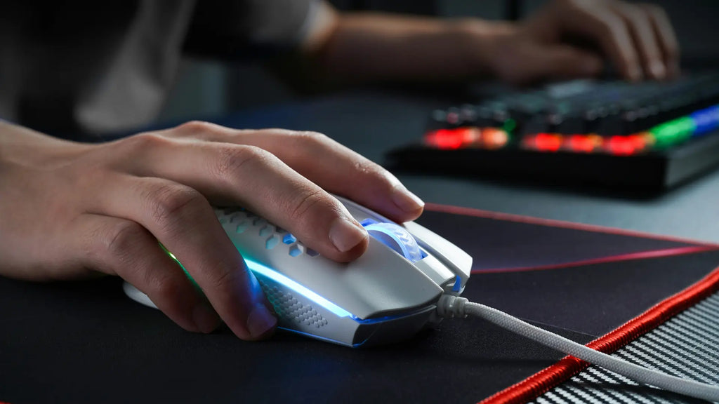hand on wired gaming mouse