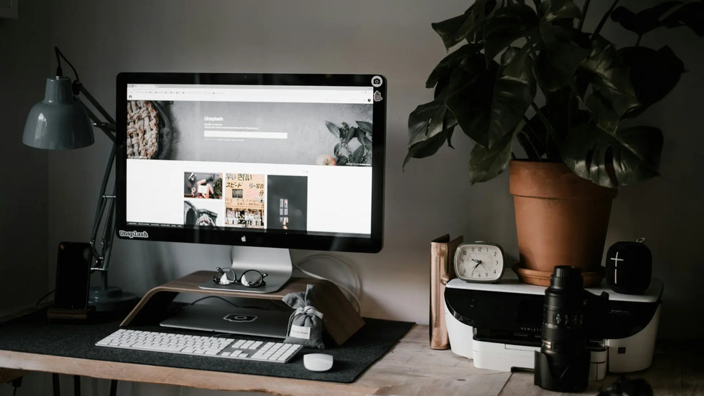 imac with ergonomic accessories on a working desk