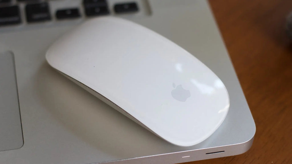 magic mouse placed on macbook