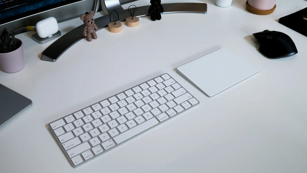 magic trackpad with mouse and keyboard on workdesk