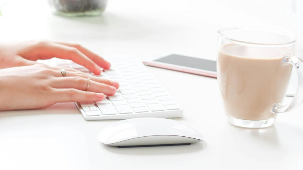 person working with magic mouse