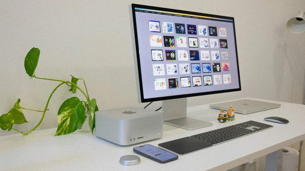 workdesk setup with mac studio, magic mouse and magic trackpad