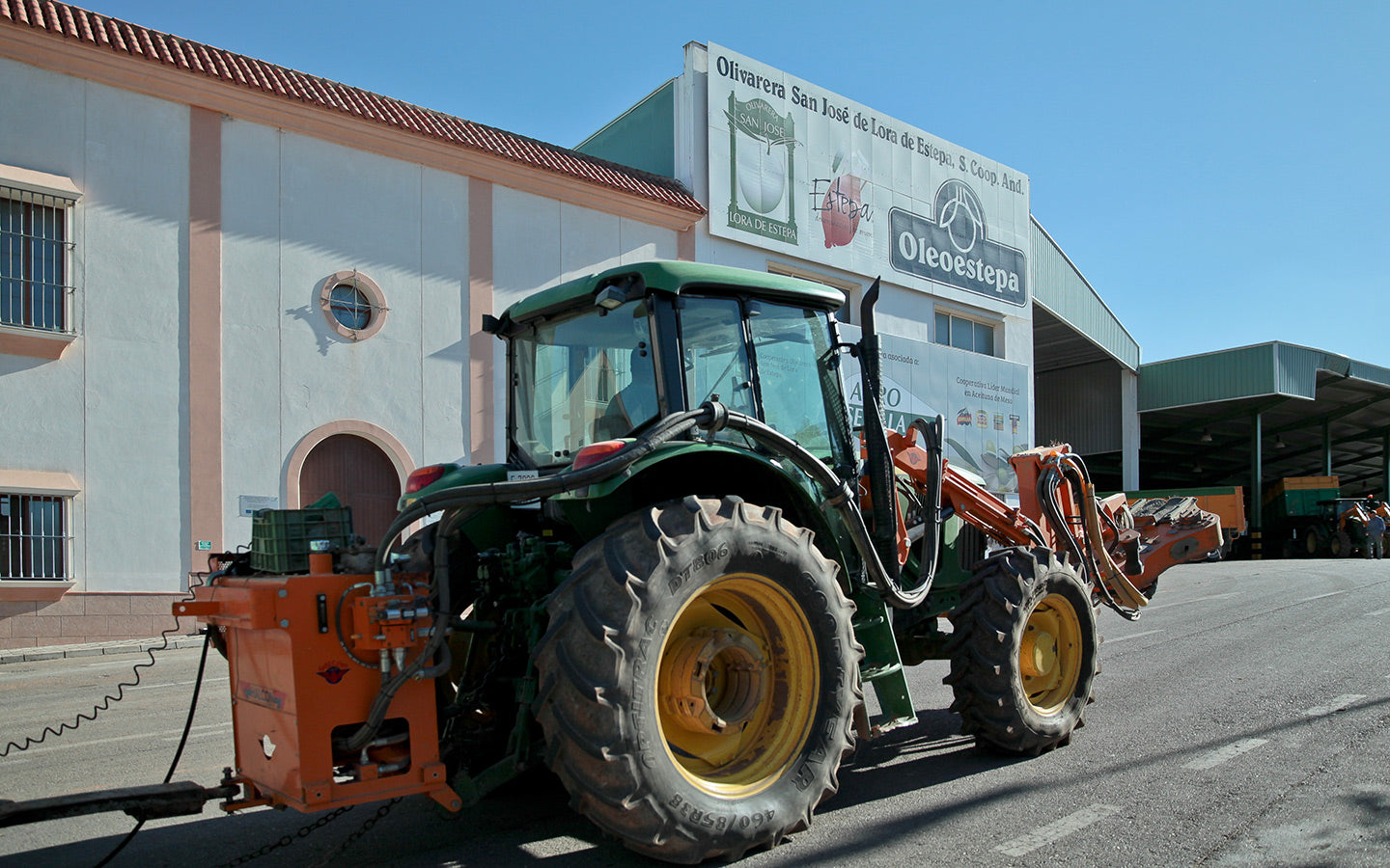 A tractor rolls towards one of the Oleoestepa mills