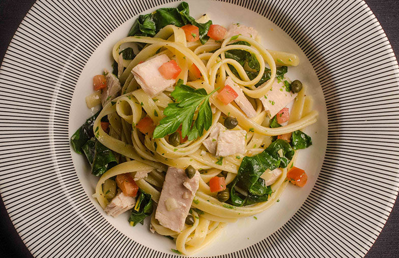 Healthy tuna salad with pasta and olive oil