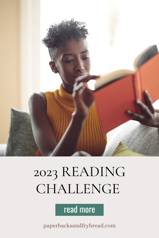 2023 Reading Challenge Pinterest Image with Black woman in short hair reading a book.