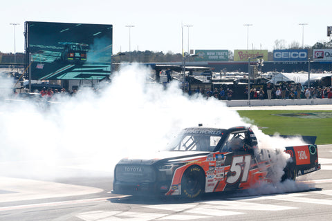Heim does a burnout after winning his first truck race at Atlanta Motor Speedway.