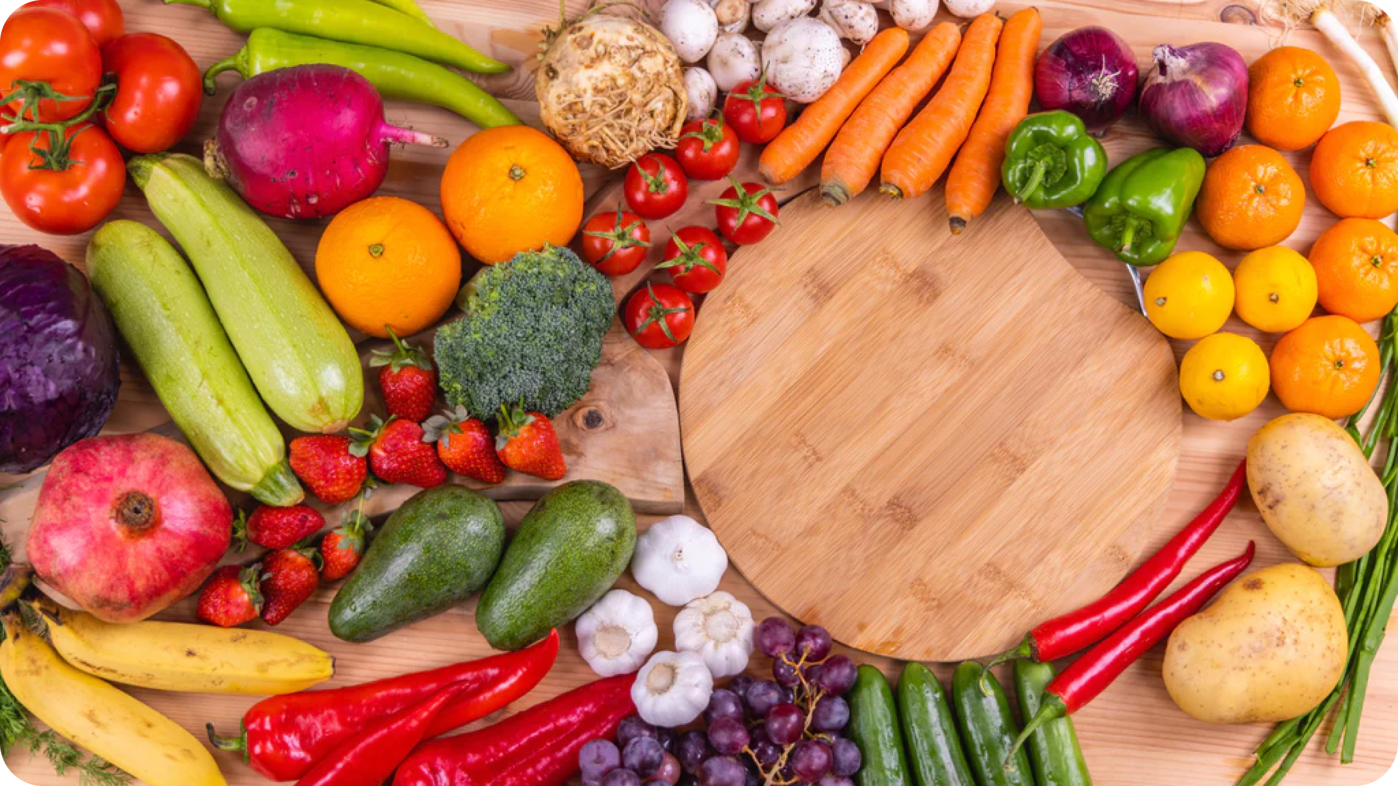 Vielfältige Auswahl an basischen Gemüsesorten, darunter Blattgrün, Karotten, Gurken und Tomaten, arrangiert als Symbol für einen ausgewogenen Säure-Basen-Haushalt und die Bedeutung des pH-Werts für eine gesunde Ernährung.