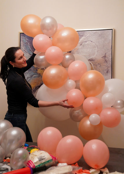 <img src="https://cdn.shopify.com/s/files/1/0572/7643/2571/files/DIY_Balloon_Garland_Tutorial_-_Creative_Balloons_Manufacturing_Inc_-_4_600x600.jpg?v=1658868008" alt="DIY Balloon Garland Tutorial - Creative Balloons Manufacturing Inc" />