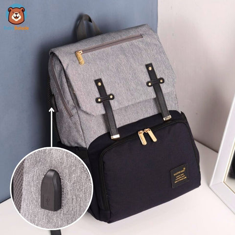 sac à dos à langer avec un port usb pour rester connecté et charger téléphone ou tablette