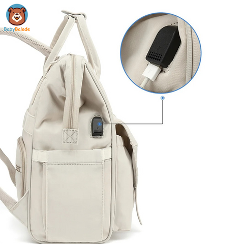 sac à dos à langer avec un port usb inclus sur le côté