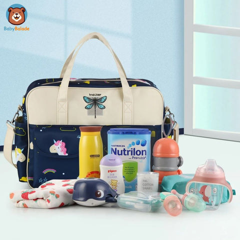 sac à langer avec plusieurs poches et compartiments conçu pour les nouveaux parents