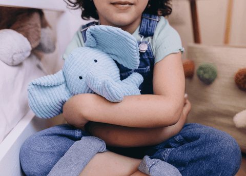 Kid with stuffed animal