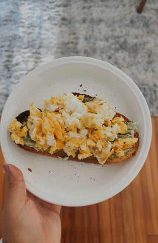 avocado toast with eggs on sourdough bread 