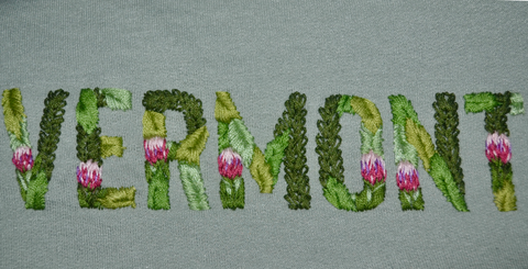 Vermont Floral Block Letter Embroidery piece featuring the state flower and greenery.