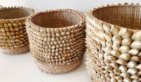 Porcupine storage baskets alongside each other on the floor