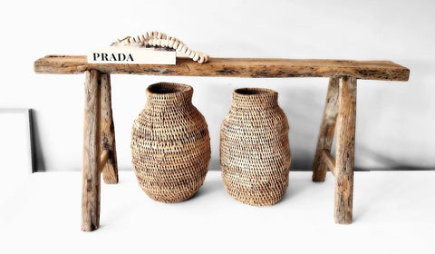 Buhera Storage Baskets underneath a Chinese wood elm bench