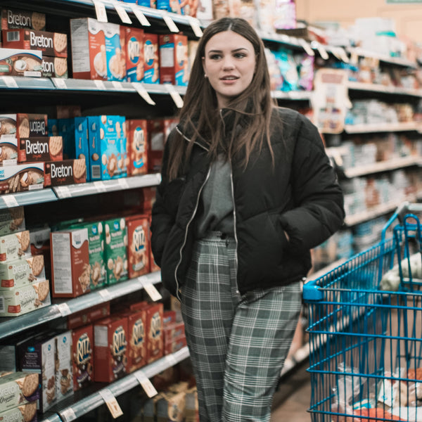 Black jacket and plaid pants