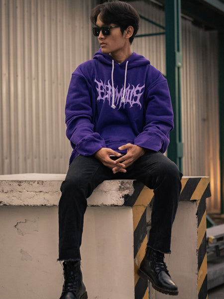 Black outfit with purple hooded sweatshirt