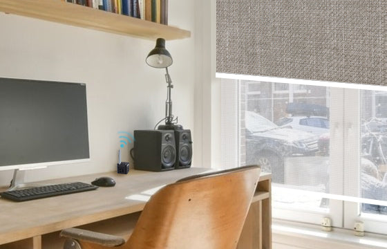 Next to the clean desk is a dual shade to ensure privacy.