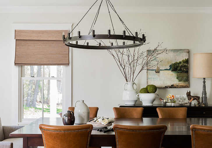 Modern dining room with woven wood shades