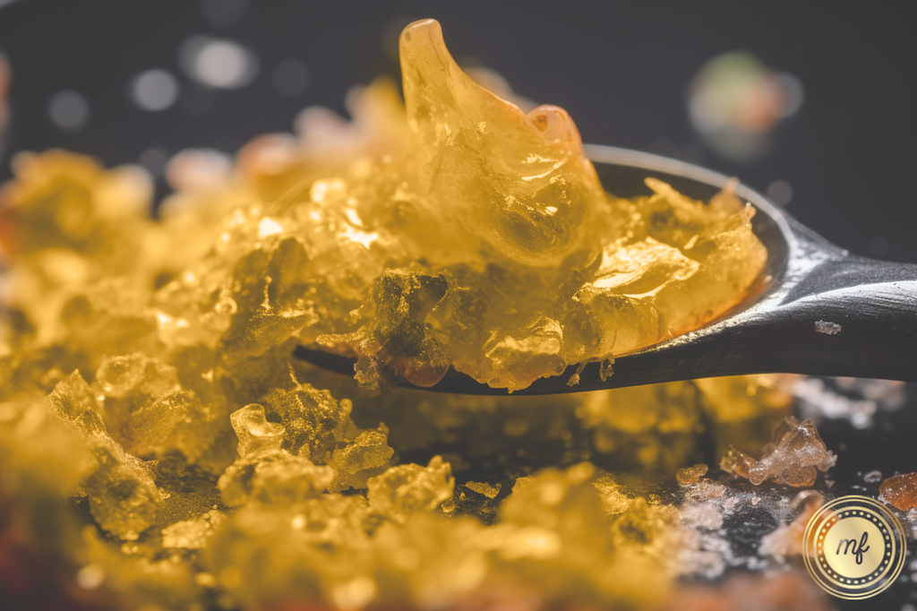 A close up shot of a small spoon picking up a bit of golden resin from a pile.