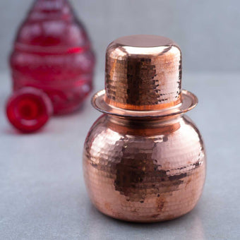 https://cdn.shopify.com/s/files/1/0573/0982/3116/products/copper-water-pot-with-cup-sombu-lota-zishta-traditional-cookware_340x.jpg?v=1656052076
