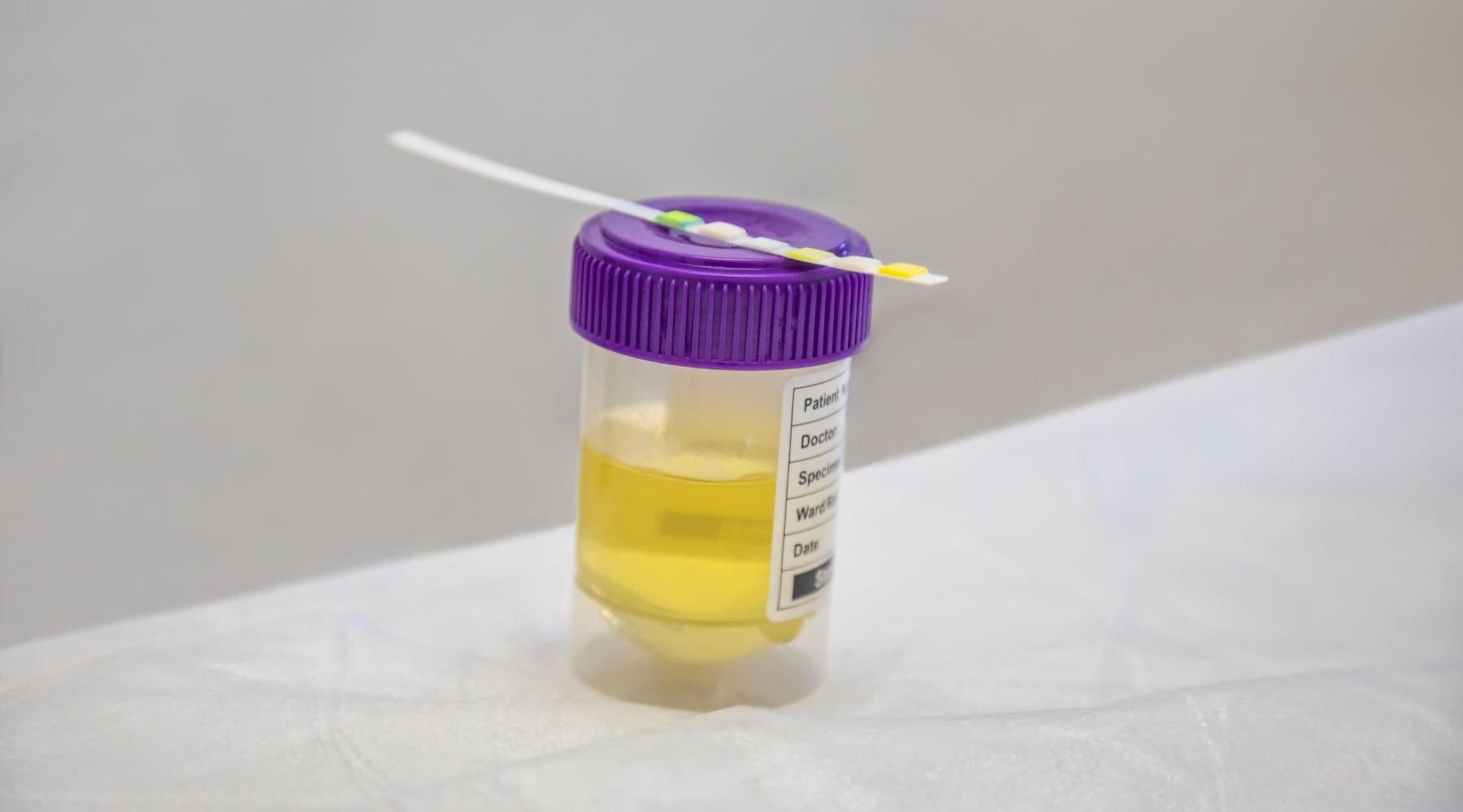 A drug test designed to detect delta-9 THC in urine on a table.