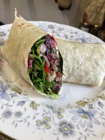 A wrap made from reduced items and Sunday lunch leftover lamb.