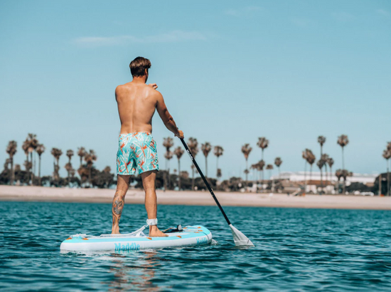 Man on paddle board burning lots of calories