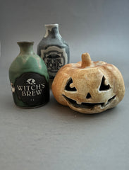 handmade ceramic halloween pumpkin and decor bottles