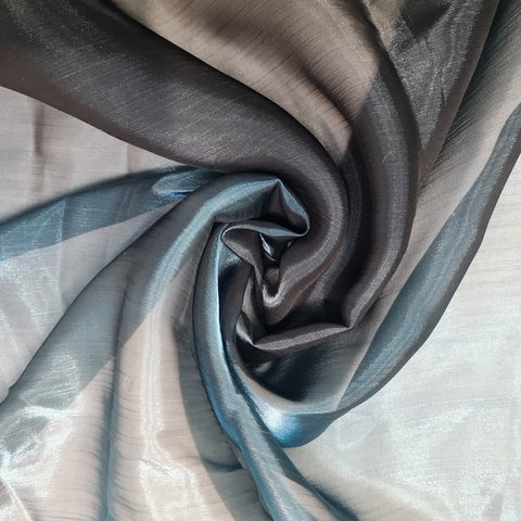 Different fabrics. Organza, chiffon, silk, jacquard are spread out