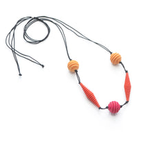 Optical geometric beaded necklace