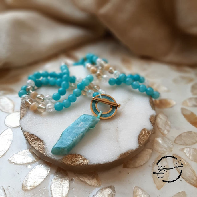 This gorgeous tasbih is made of natural amazonite and trochus shell beads. It can also be worn as a necklace. 99 beads