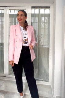 pink blazer with t-shirt background woman of the essence sub-saharan africa